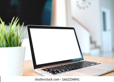 Computer Laptop With Blank Screen On Table Of Liveing Room Blur Background With Bokeh, Desk Blank Work Office Mockup Monitor