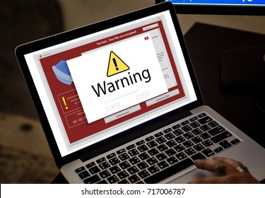 Computer Laptop With Hack Warning Pop Up