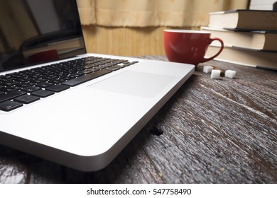 Computer laptop on working table.