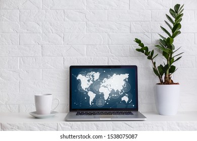 computer laptop screen world map