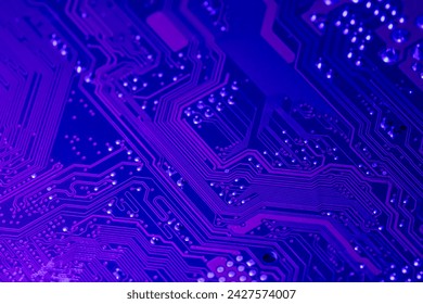 computer mainboard. electronic technology background. toned blue. macro shot.