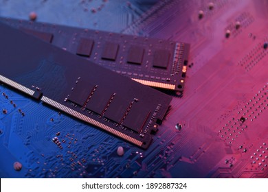 Computer memory RAM on motherboard background . Close up. system, main memory, random access memory, onboard, computer detail. Computer components . DDR3. DDR4. DDR5 - Shutterstock ID 1892887324