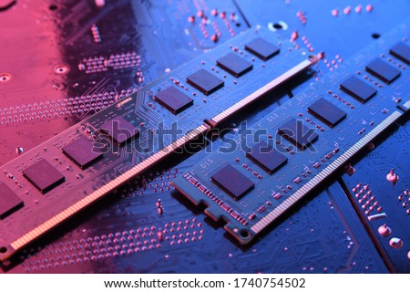Computer memory RAM on motherboard background . Close up. system, main memory, random access memory, onboard, computer detail. Computer components . DDR3. DDR4. DDR5