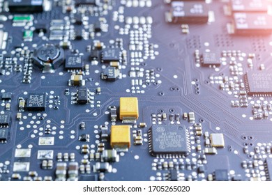 Computer microchip circuit background. Blue chip motherboard Abstract technology texture with soft light. Futuristic Electronic concept