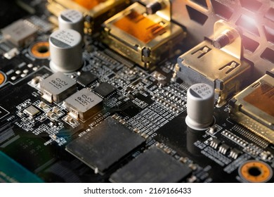 Computer Microchips on Electronic circuit board. Technology microelectronics concept background. Macro shot, selective focus, extremely shallow DOF