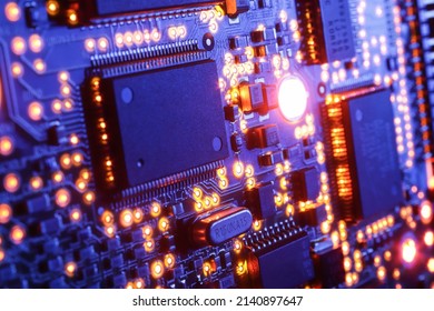 Computer Microchips and Processors on Electronic circuit board. Computer hardware technology. Abstract technology microelectronics concept background. Macro shot, shallow focus.