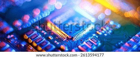 Computer Microchips and Processors on Electronic circuit board. Abstract technology microelectronics concept background. Macro shot, shallow focus.