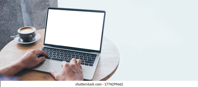 computer mockup image blank screen.hand man work using laptop with white background for advertising,contact business search information on desk at coffee shop.marketing and creative design - Shutterstock ID 1774299662