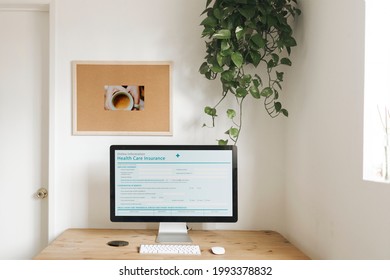 Computer mockup on a wooden table for work from home during corona outbreak