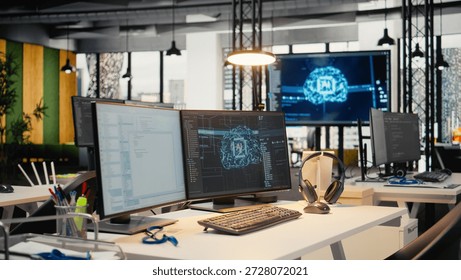 Computer monitors in empty startup workspace with cloud computing AI resources. PC screens in modern office constructing neural network algorithms using programming languages