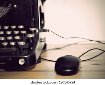 Computer Mouse Connected To Vintage Typewriter