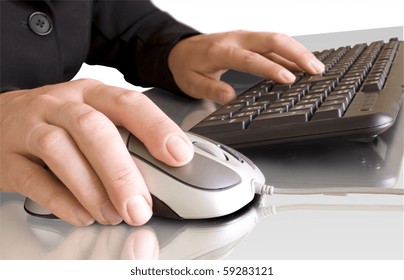 computer mouse in hand and keyboard with reflection isolated on white