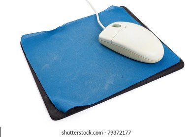 Computer Mouse And Old Mouse Pad Close Up