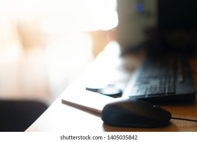 Computer mouse on the desk for work at home concept