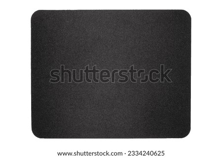 A computer mouse pad on a white background.Mouse pad made of thick black fabric.A computer mat.