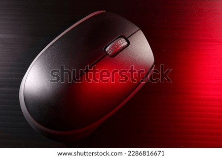 Computer Mouse in Red Light Ambience