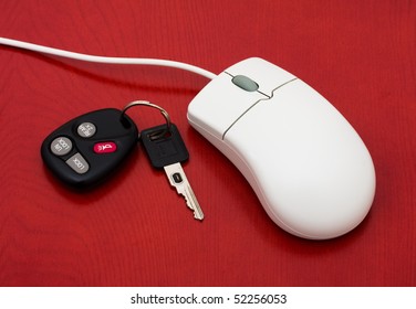 A Computer Mouse With A Set Of Car Keys On A Red Background, Online Car Shopping,