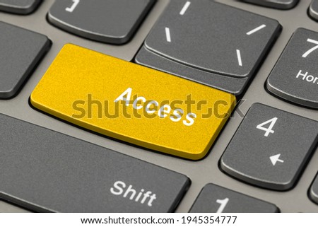 Computer notebook keyboard with Access key - technology background