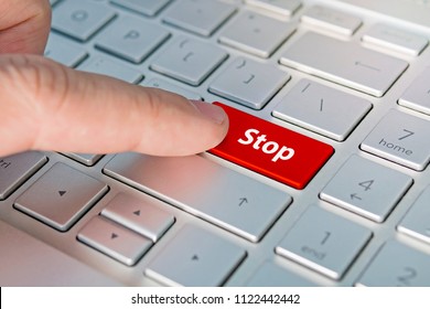 Computer notebook keyboard with Stop key - technology background. , Red button. - Shutterstock ID 1122442442