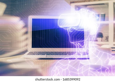 Computer on desktop with AR theme icon. Multi exposure. Concept of augmented reality.
