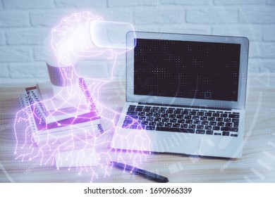 Computer on desktop with AR theme icon. Multi exposure. Concept of augmented reality.