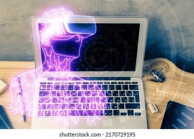Computer on desktop with AR theme icon. Multi exposure. Concept of augmented reality.