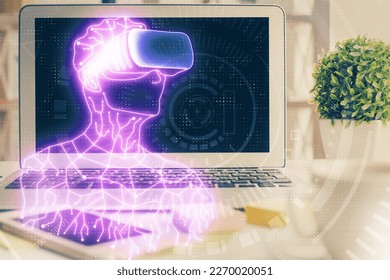 Computer on desktop with AR theme icon. Multi exposure. Concept of augmented reality.