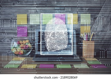 Computer on desktop in office with finger print drawing. Double exposure. Concept of business data security. - Shutterstock ID 2189028069
