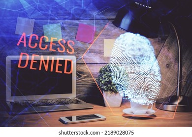 Computer on desktop in office with finger print drawing. Double exposure. Concept of business data security. - Shutterstock ID 2189028075