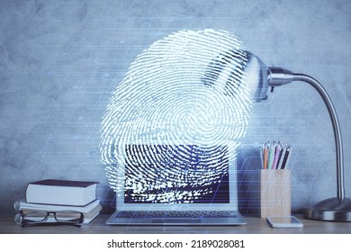 Computer on desktop in office with finger print drawing. Double exposure. Concept of business data security. - Shutterstock ID 2189028081