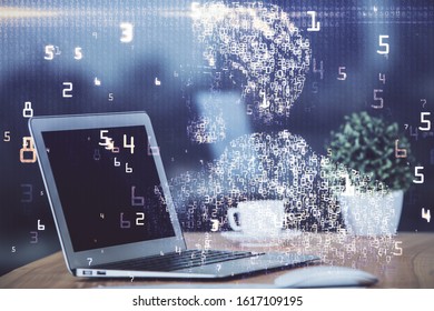 Computer on desktop in office with technology theme hologram. Multi exposure. Tech concept.