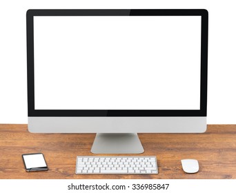 Computer on white table, close-up, monitor, keyboard and mouse
