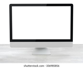 Computer on white table, close-up, monitor