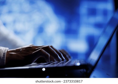 Computer operator using laptop to maintenance artificial intelligence neural networks simulating human thought processes in computerized model. Tech support doing checkup on AI systems, close up