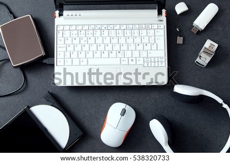 Computer peripherals & laptop accessories. Composition on stone counter