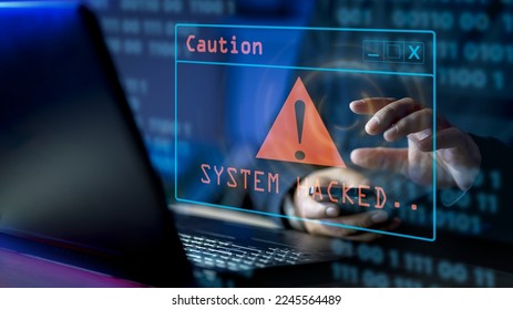 A computer popup box screen warning of a system being hacked, System hacked alert after cyber attack on computer network. internet virus cyber security and cybercrime. hackers to steal the information - Shutterstock ID 2245564489