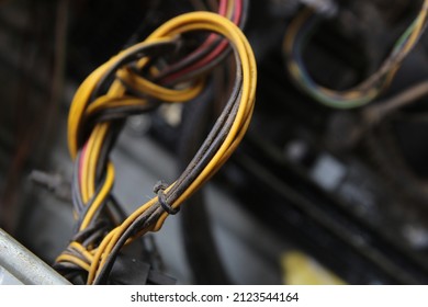 A Computer Power Cable Network That Will Be Cleaned In A Low Light Room.