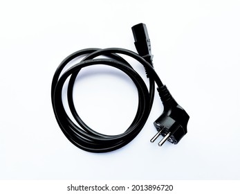 Computer Power Cord. White Background And Black Cable.