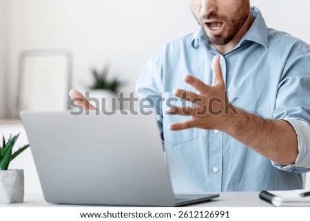 Computer Problems. Angry Businessman Shouting At Laptop In Office, Emotionally Reacting To System Error, Free Space