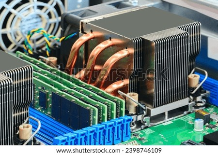 Computer processor with liquid cooling radiator on motherboard