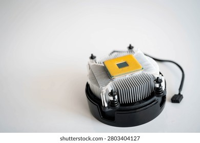 Computer processor on CPU cooler with copy space showing semiconductor technology, PC hardware and cooling system. Concept of computer assembly, processor installation, digital engineering and high performance computing.