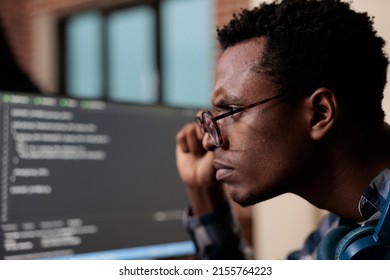 Computer Programmer Puzzled By Nonfunctional Security Algorithm And Company Corrupted Database. Confused Tech Engineer Sitting Doubtful At Computer Trying To Solve Network Processing Errors.