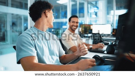 Computer, programmer and team with man in office for game designer, coding app and ux update. Software development, research and level gameplay with employees at night for coworking collaboration