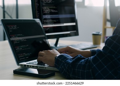 Computer programmer working on new software program.Coder recruited for solve all the script failures and renown the cyber safety of the corporation.