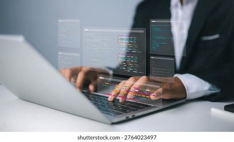 Computer programming and web engineering with laptop.Professional software developer working with multiple coding screens.Complex data script development for digital technology.