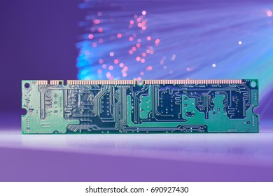 Computer RAM Memory Chip Data Concept  On Background With Fiber Optics And Reflections On White  Lighted Table