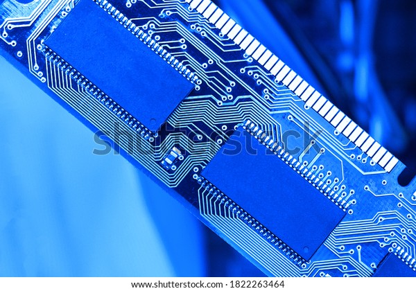 Computer RAM, system, main memory, random\
access memory, high-tech computer detail toned blue close-up, new\
modern intelligent\
technology.