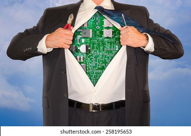 Computer repair and engineer tech support superman opening his shirt to reveal his robotic computer body with repair tools in his hands. Also represents technical education and training.