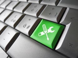 Computer Repair Service Concept With Work Tools Icons And Symbol On A Green Laptop Computer Key For Website And Online Business.