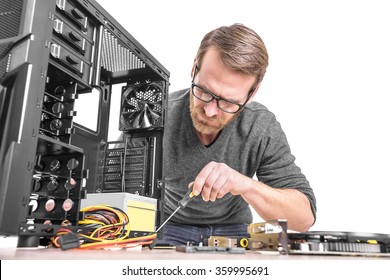 Computer Repair. Computer Technician Working On A Personal Computer.